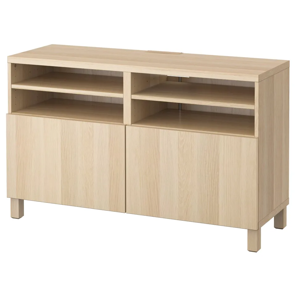 Light wood tv stand: BESTÅ. Two closed cabinets, two open shelves, sleek and modern.