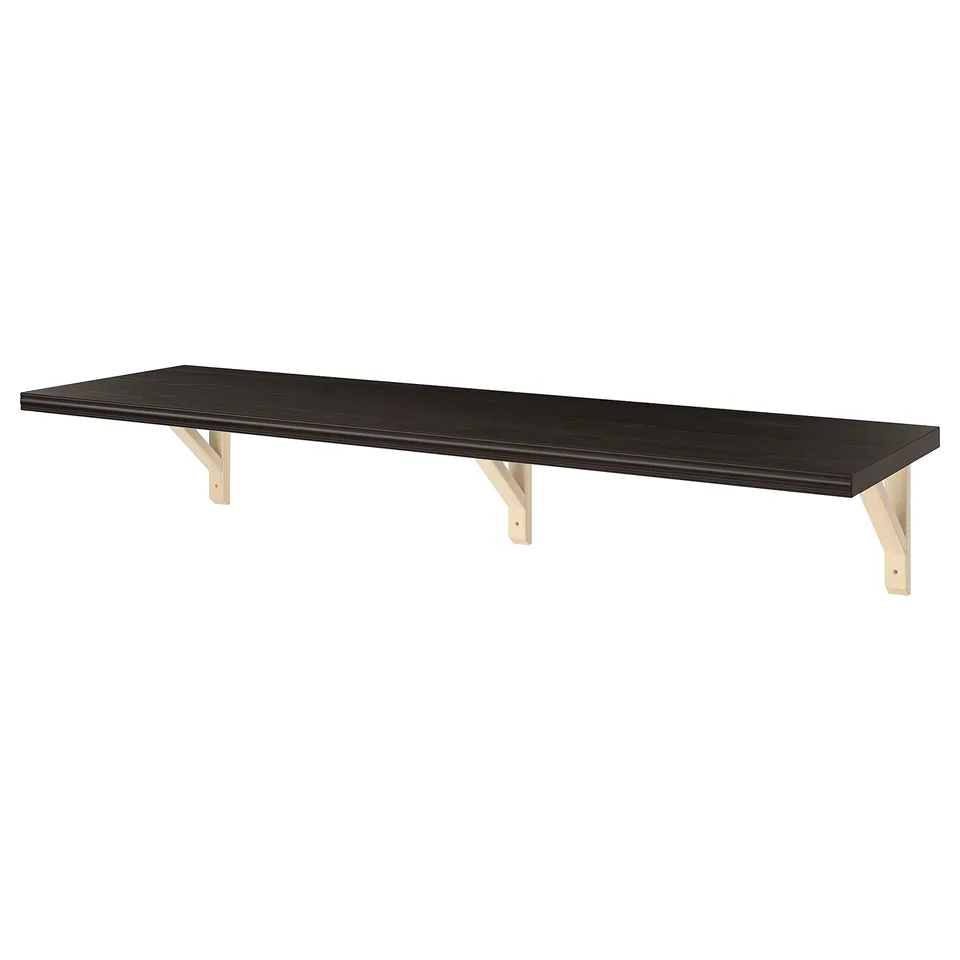 A black BERGSHULT wall shelf with bevelled and smooth edges, mounted on wooden brackets.