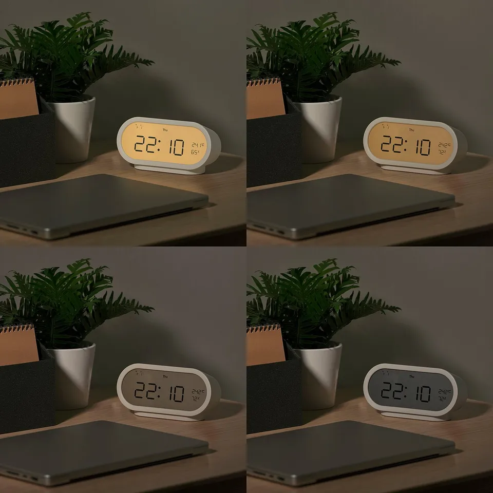 Four views of a digital clock on a desk with a laptop and plant. The clock shows time, temperature, and humidity.