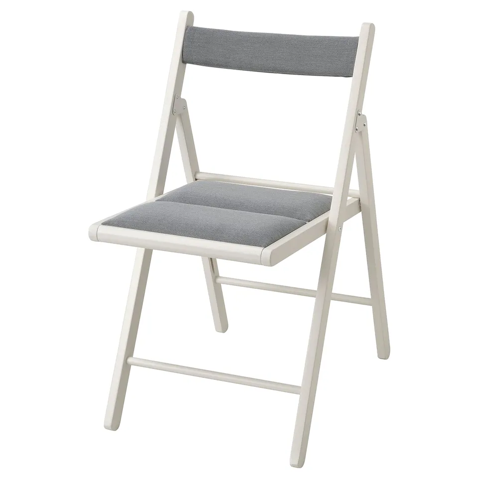 White folding chair: FRÖSVI; comfortable, eco-friendly, space-saving design.