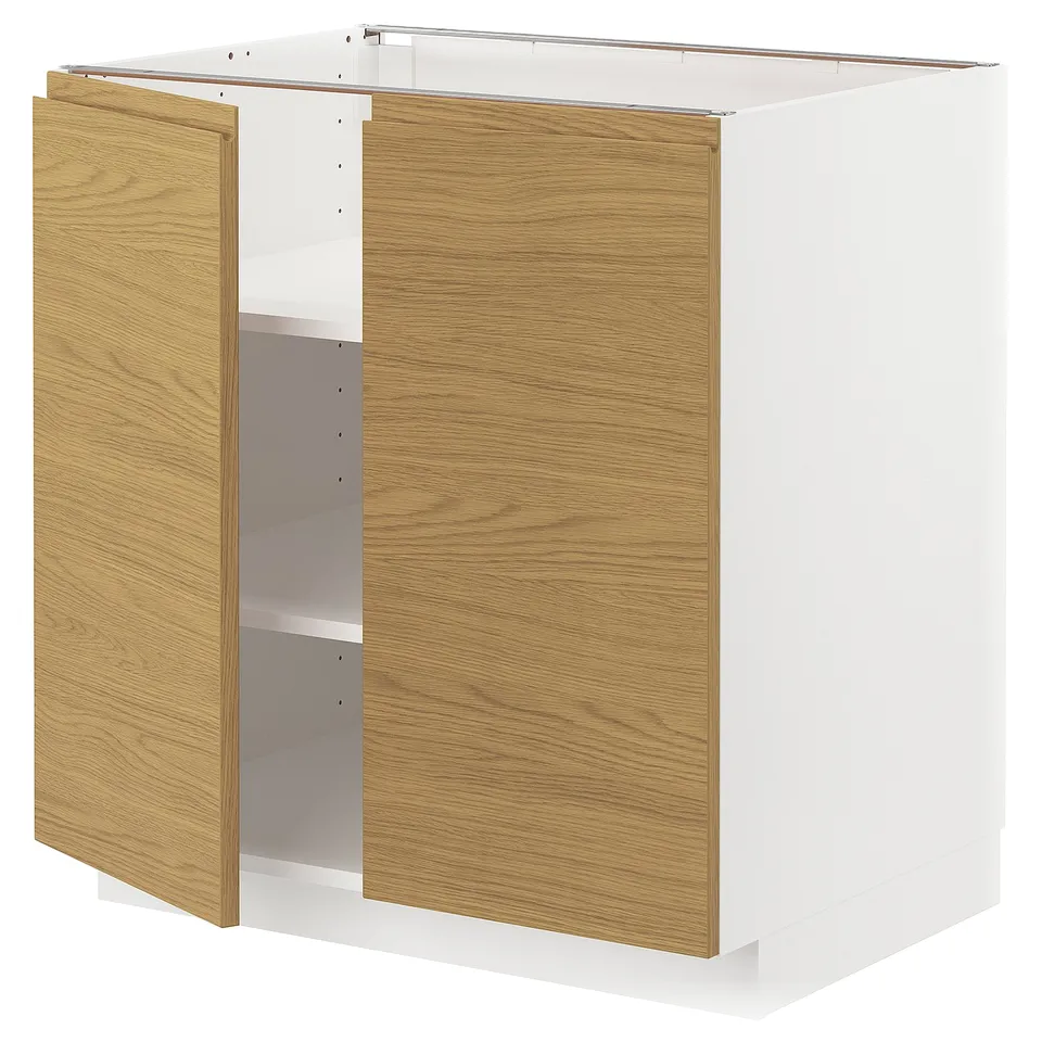 METOD kitchen unit with oak-effect doors, minimalist design, white frame.