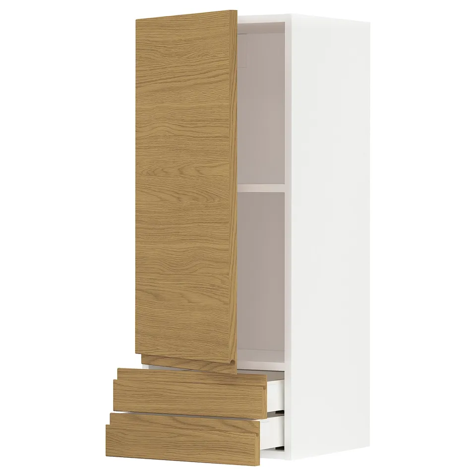 A white and light wood METOD kitchen cabinet with three drawers and one open shelf. The design is sleek with integrated handles.