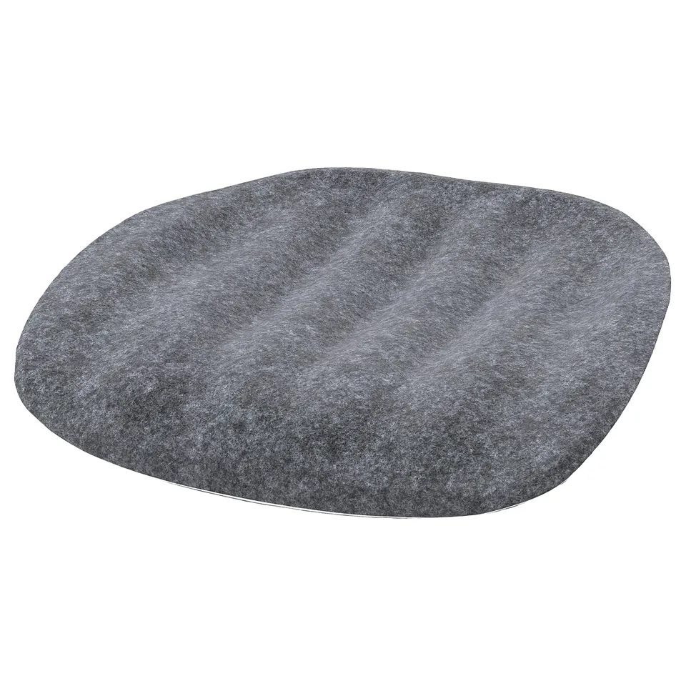 Grey circular felted cushion with soft, irregular shape for comfort.