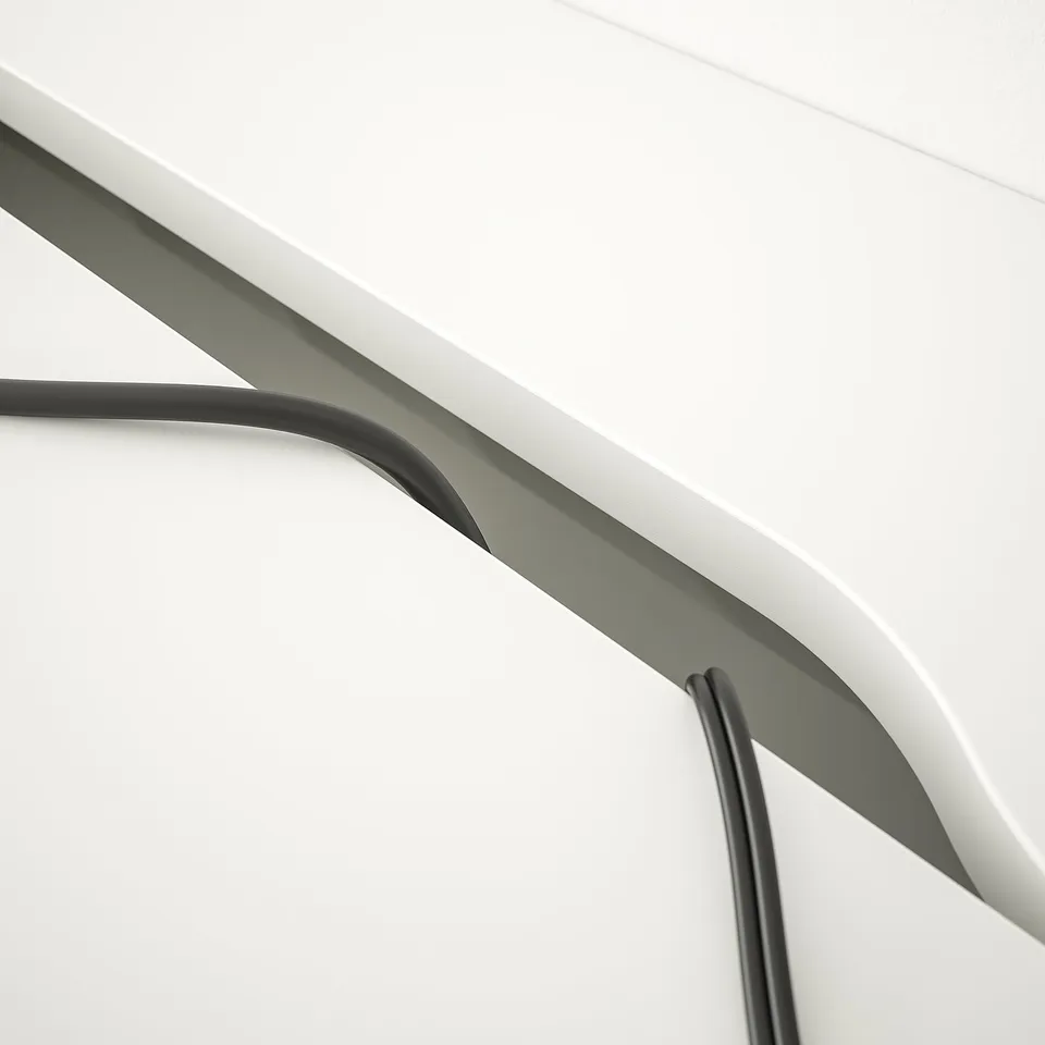 Desk with built-in storage and cable management, sleek minimalist design.