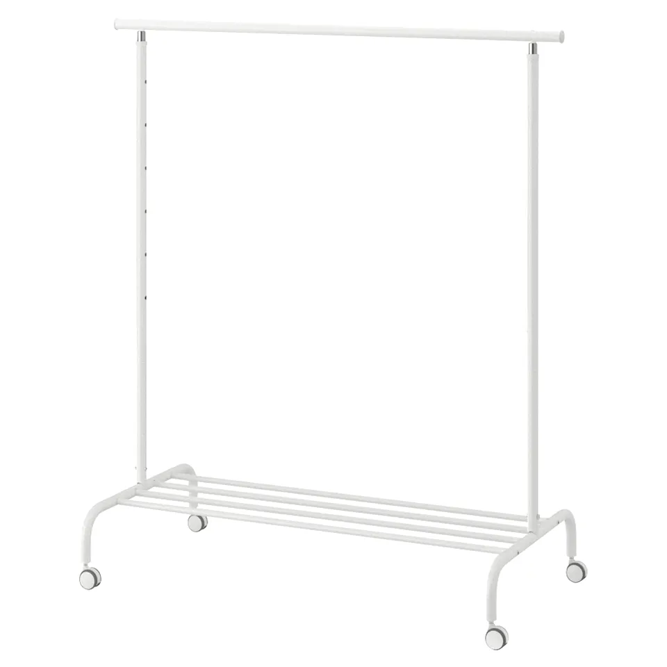 A white RIGGA clothing rack with four adjustable height levels, wheels for mobility, and a bottom shelf for storage.