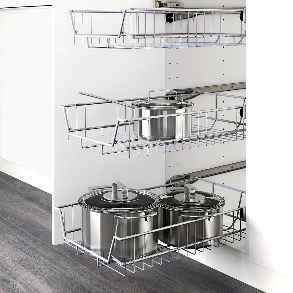 Kitchen cabinet with three wire shelves for pots and pans, part of METOD system.