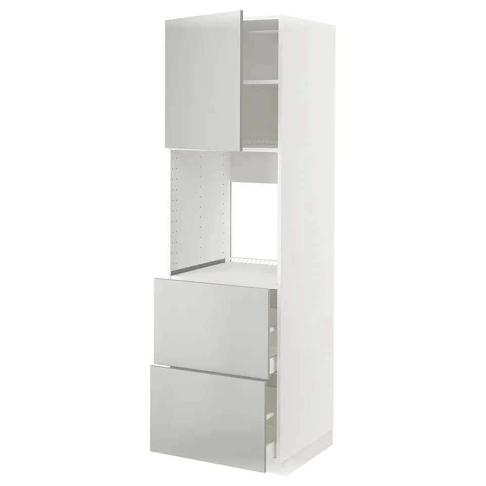 A white METOD kitchen cabinet with light grey havstorp doors, sleek and modern with a clean design.