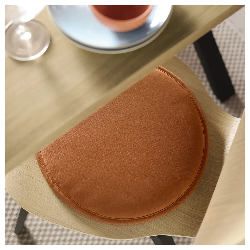 Brown recycled fabric chair pad, semi-circle with anti-slip back, indoors/outdoors.