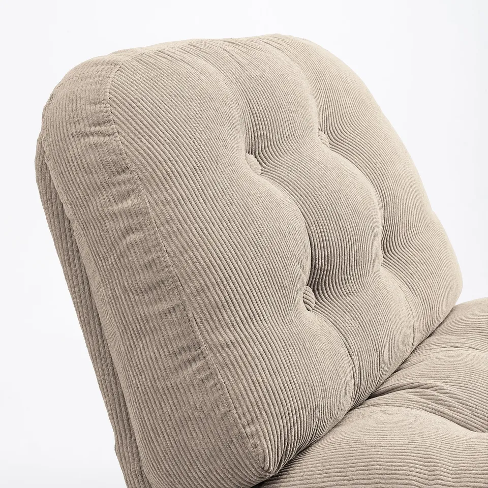 Close-up of a plush, beige swivel chairs backrest, showcasing soft, textured fabric and ergonomic design for comfort.