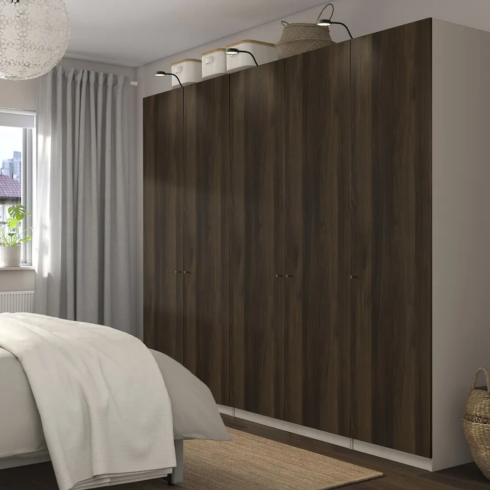 Wardrobe, bed, window with curtains. Rug & basket nearby. Dark wardrobe option.