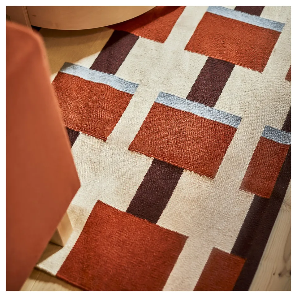 STOCKHOLM 2025 rug, red-orange, beige, geometric, rectangular, wool.