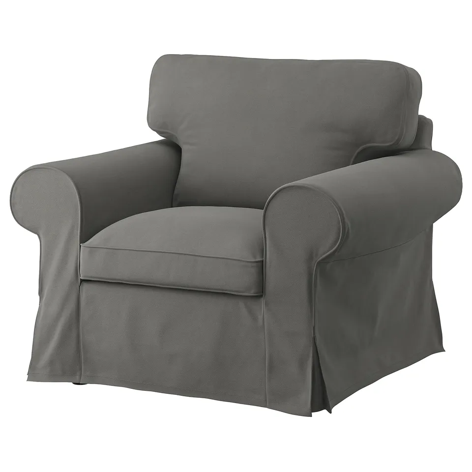 An EKTORP grey armchair with a soft, rounded design and removable, machine-washable cover.