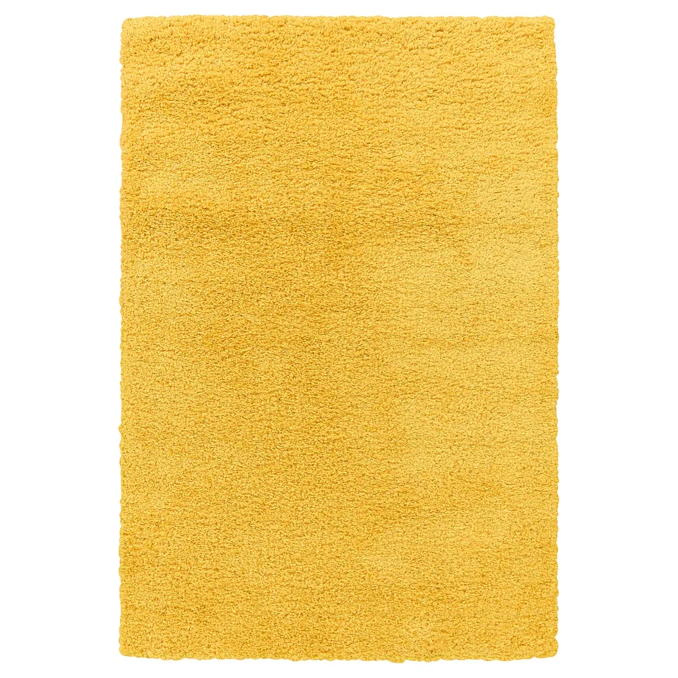 Bright yellow, rectangular, thick-piled area rug. Soft, shaggy texture, designed for comfort.