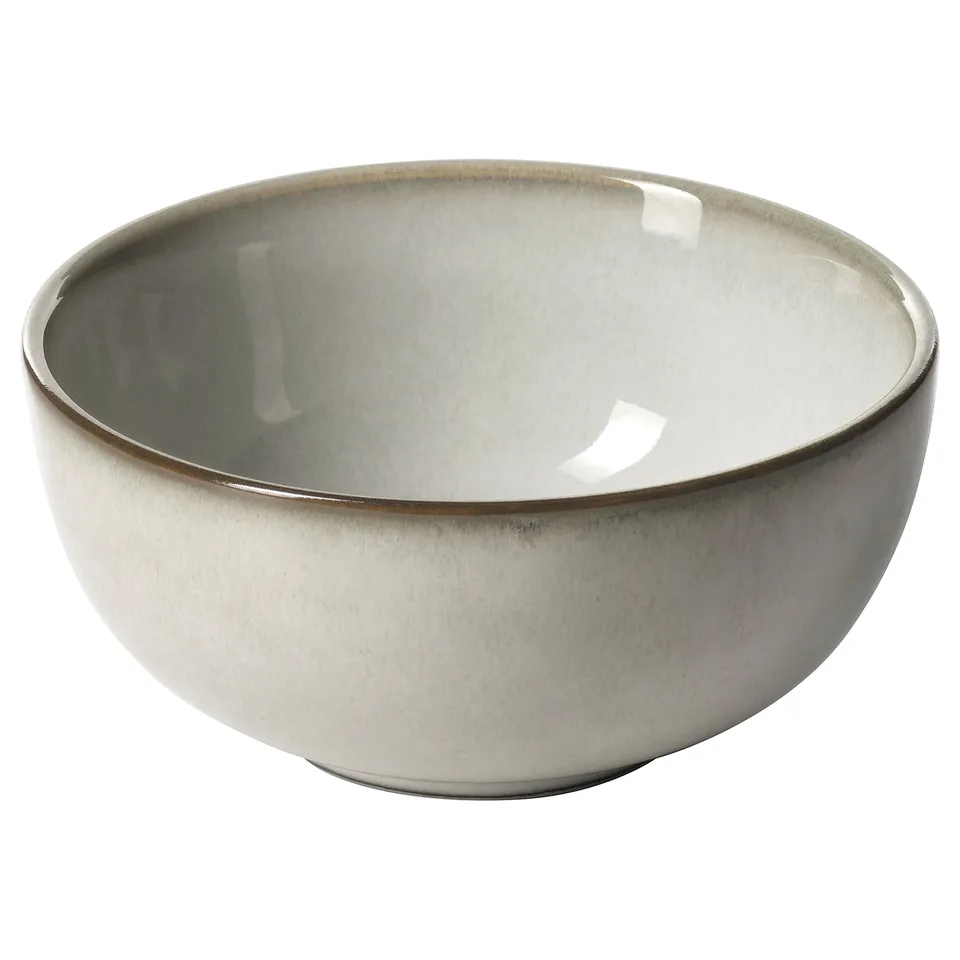 GLADELIG bowl, sand-colored, ceramic. Rounded shape. Reactive glaze finish. Elegant, casual design.