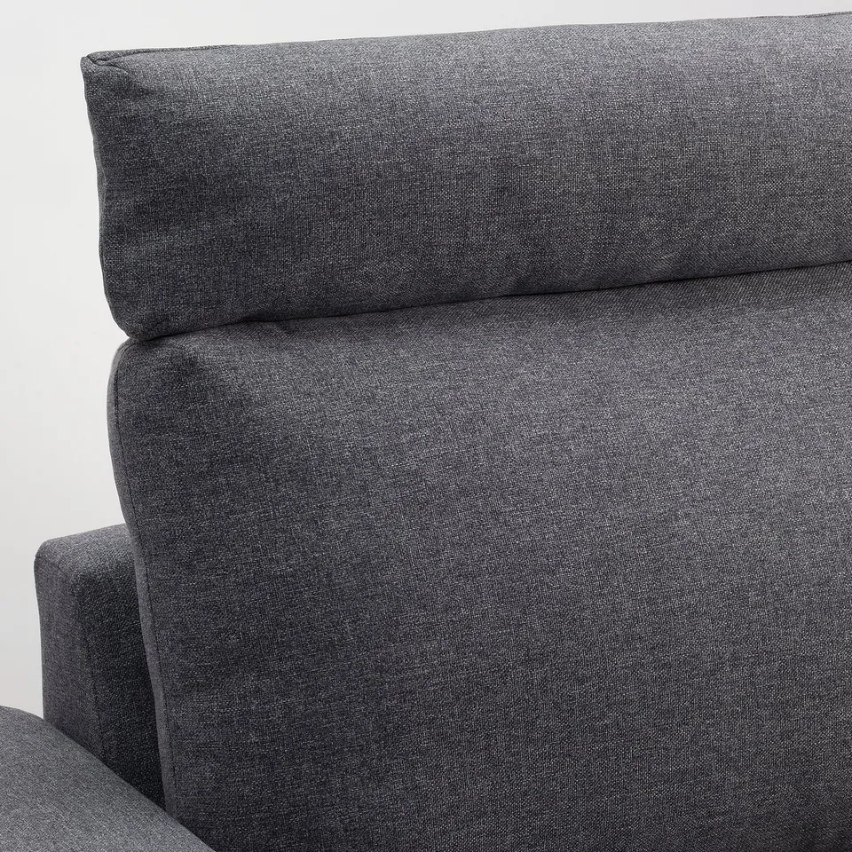 Close-up of a modern, grey sofa with soft, supportive cushions, showcasing its high-quality fabric and comfortable design.