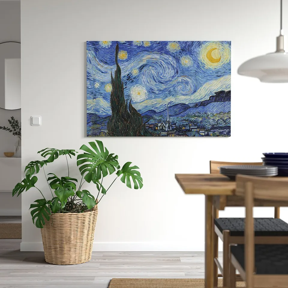 PJÄTTERYD starry night by van gogh on white wall in minimalist dining room.