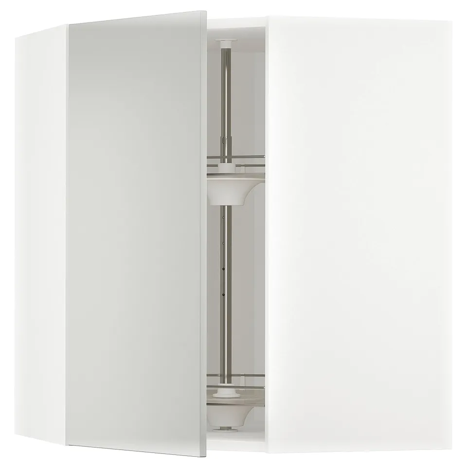 A white METOD kitchen unit, featuring sleek grey havstorp doors, modern and minimalist design with a glass shelf carousel inside.