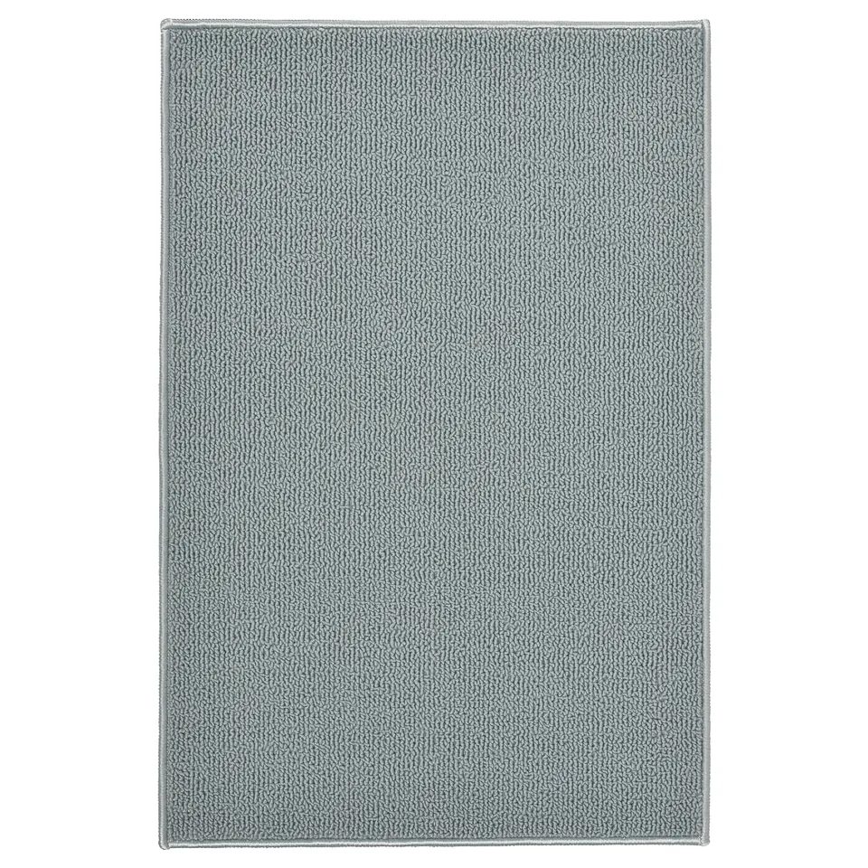 FINTSEN grey bath mat, rectangular, textured design, made of recycled polyester.