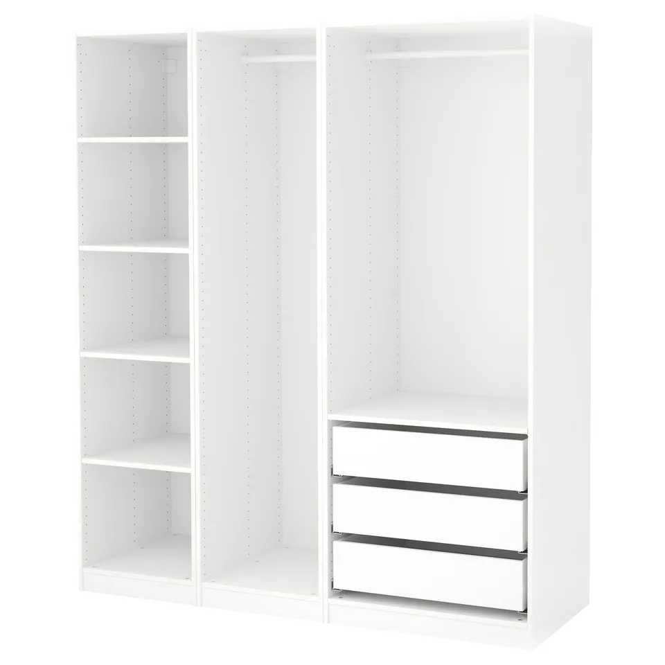 White PAX wardrobe system with shelves and drawers. Minimalist design, clean lines, modern. Ideal for organising clothes and accessories.