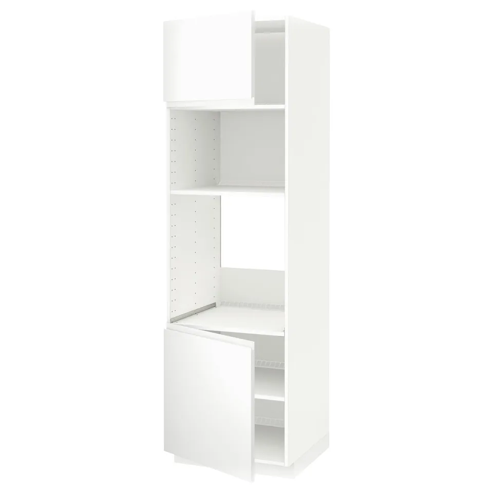 A white METOD kitchen cabinet with adjustable shelves and a minimalist design.