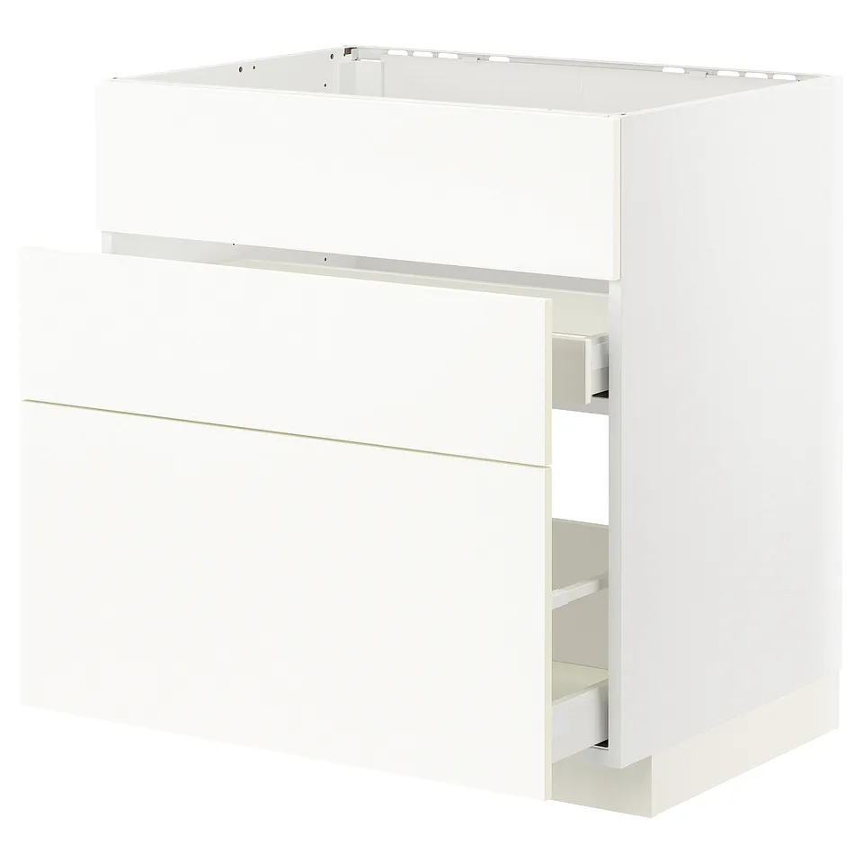 White ikea METOD kitchen cabinet set. Includes base, tall unit, and drawers with sleek, modern design.