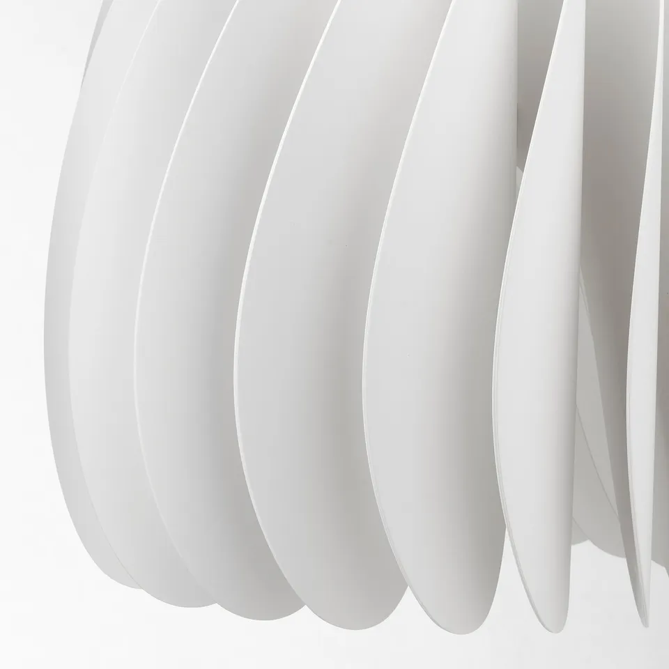 Modern pendant lamp with curved, white recycled plastic panels. Elegantly diffuses light.