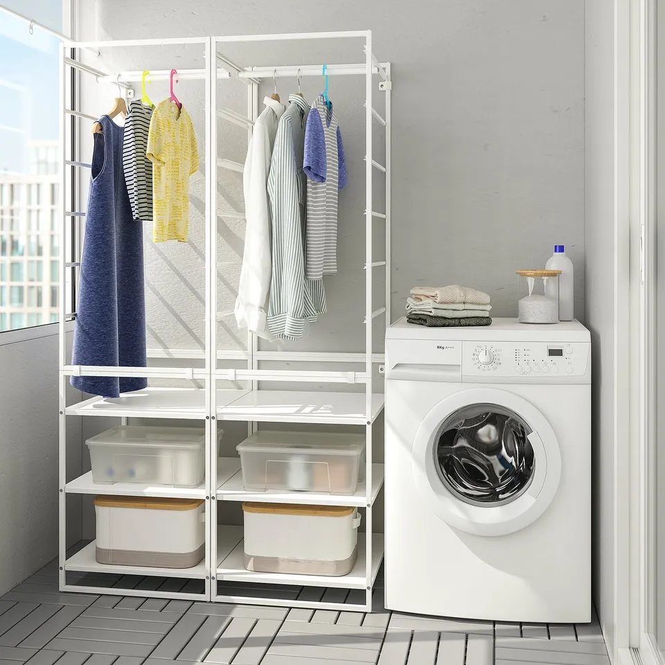 Modern laundry room with JONAXEL storage, neatly organised.