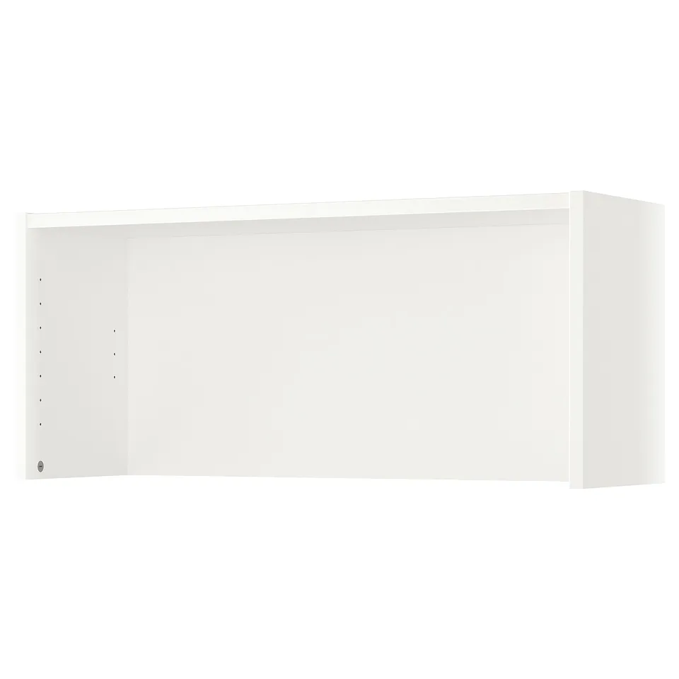 White BILLY bookcase, rectangular, minimalist design, particleboard and paper edging, leaning against wall.