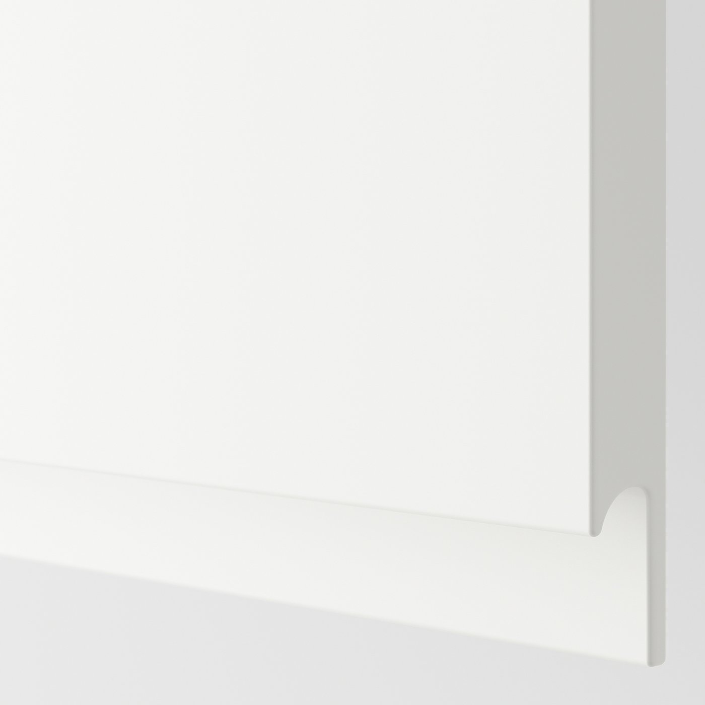 Close-up of white bathroom fixture edge.