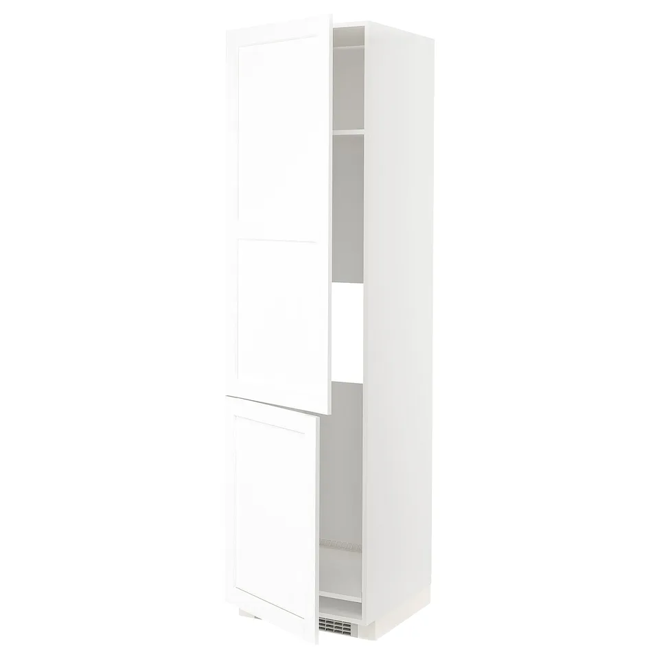 White METOD kitchen cabinet with two doors, subtle grain texture, adjustable shelves, and nickel hinges, standing upright.