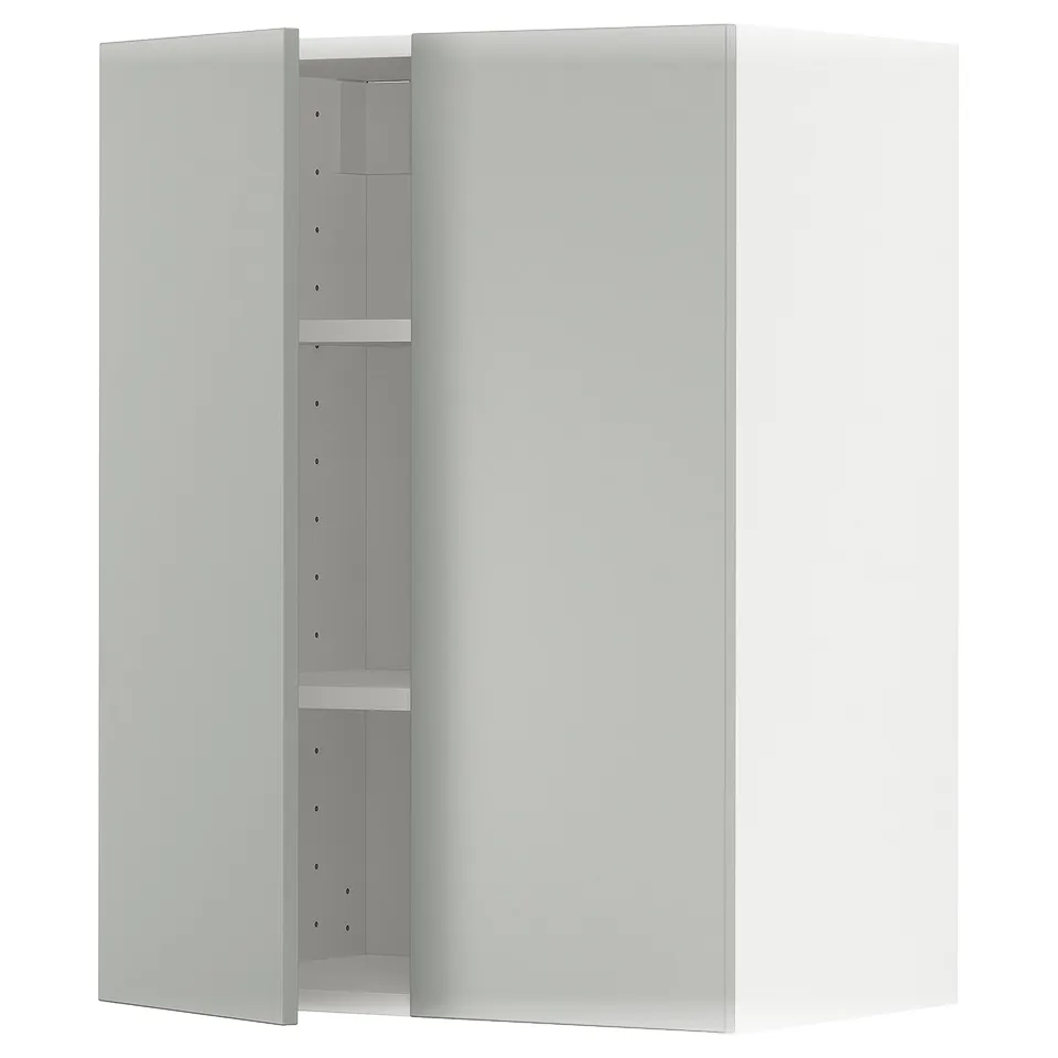 A light grey METOD kitchen cabinet with shelves and a modern design.