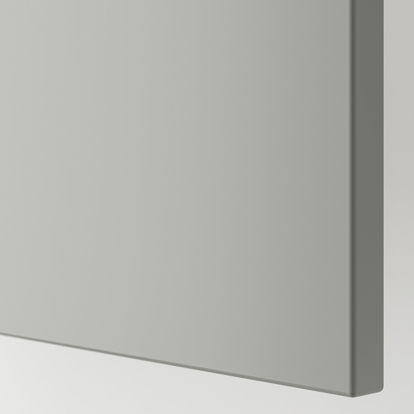 Close-up: sleek grey kitchen cabinet edge, smooth finish, modern design.