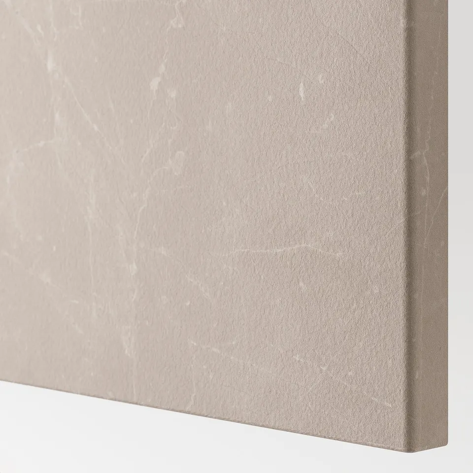 Close-up of smooth, beige textured surface with delicate veining, showing high-quality finish and tactile appeal.