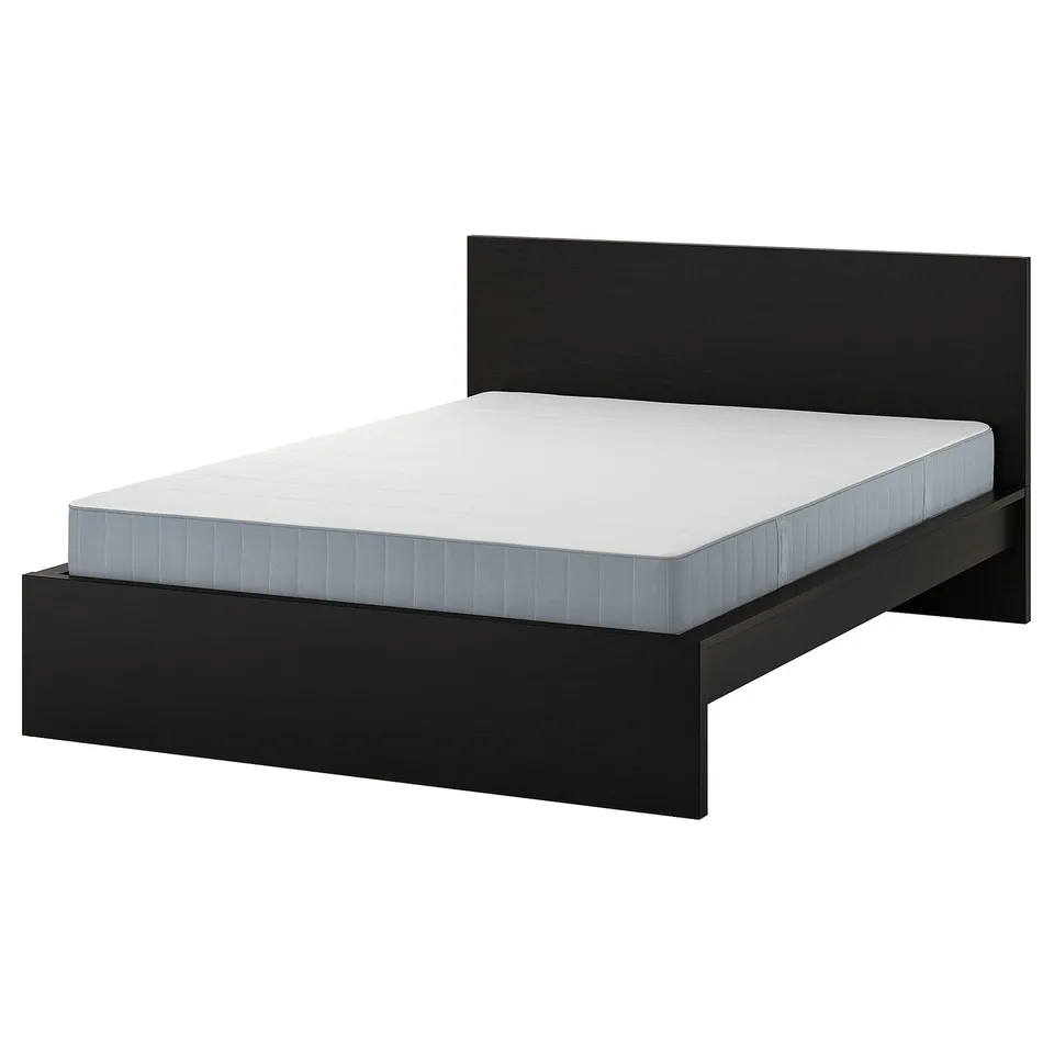 Black minimalist bed, clean design, with high headboard and white mattress.