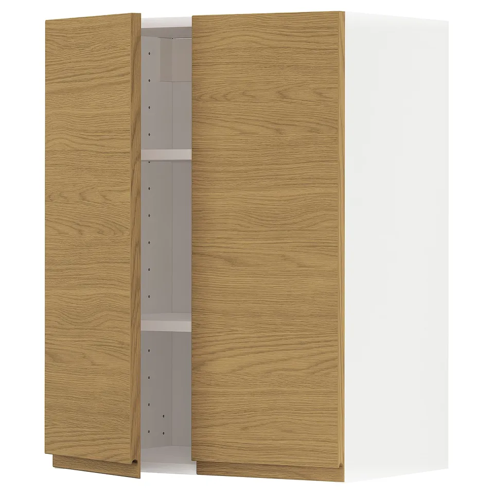 A wooden kitchen cabinet from IKEAs METOD system, with oak-effect doors and minimalist design.