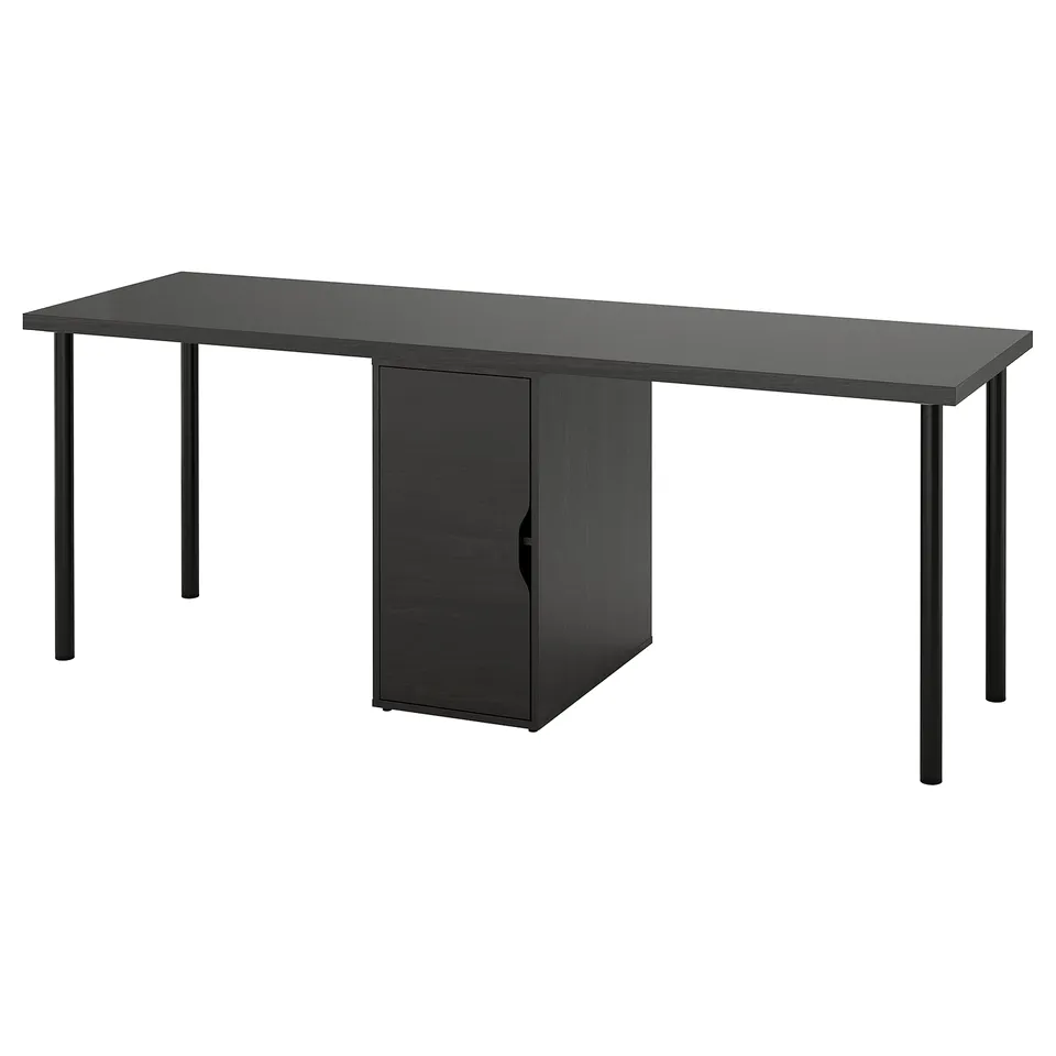 A black LAGKAPTEN desk with one drawer, sleek metal legs, and a minimalist design ideal for various settings.