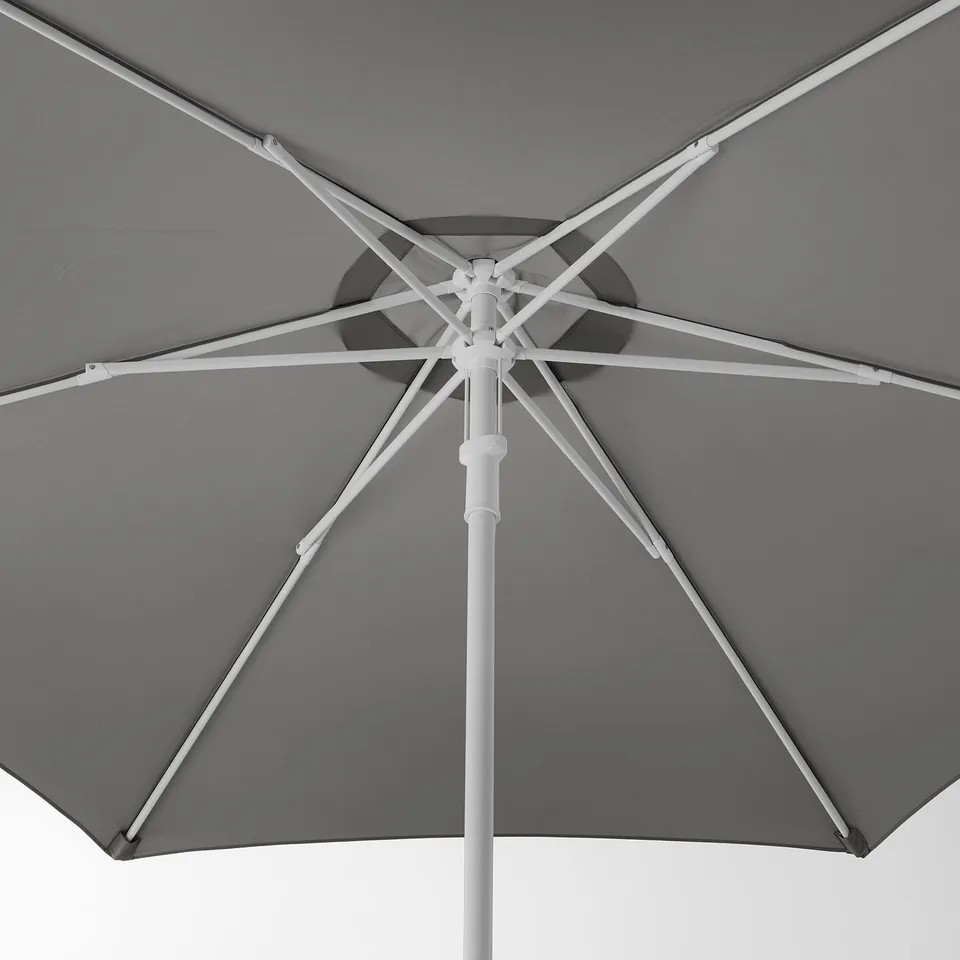 Close-up of a sturdy patio umbrellas metals and fabric, showcasing quality design and durable structure.
