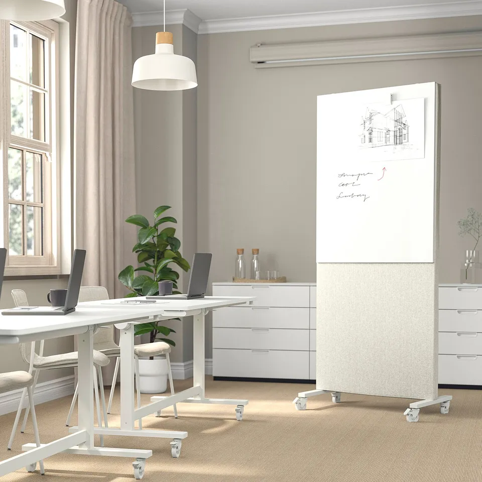 MITTZON acoustic screens in modern office, white, on casters, divide workspace.