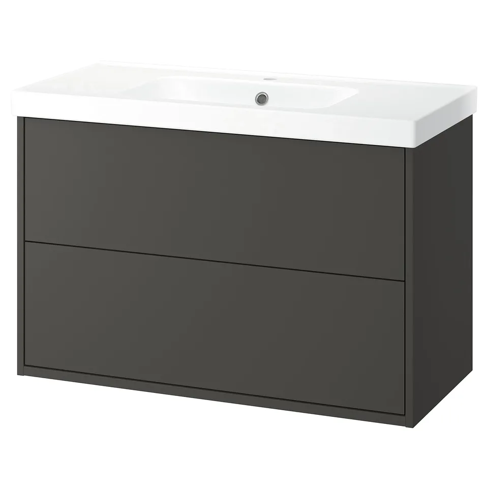 A modern grey HAVBÄCK bathroom vanity with two drawers and a white ceramic sink. The sleek design is functional with ample storage.