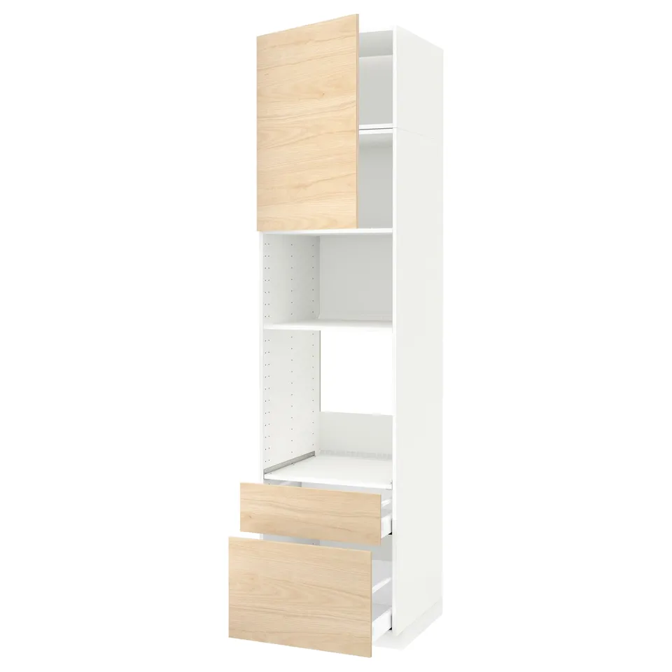 A white METOD kitchen cabinet with light ash wood drawers and shelves. It a tall storage unit with both a door and two drawers.