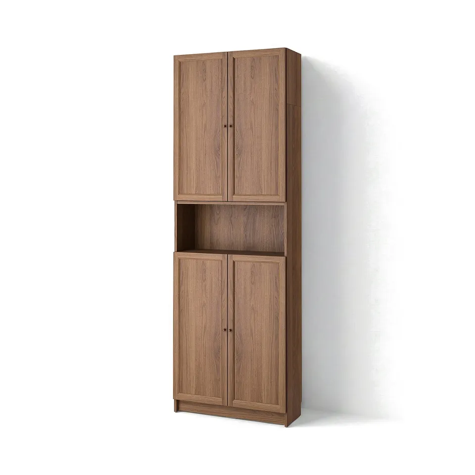A BILLY bookcase in brown with closed and open storage. Its wooden design has a natural, warm feel.