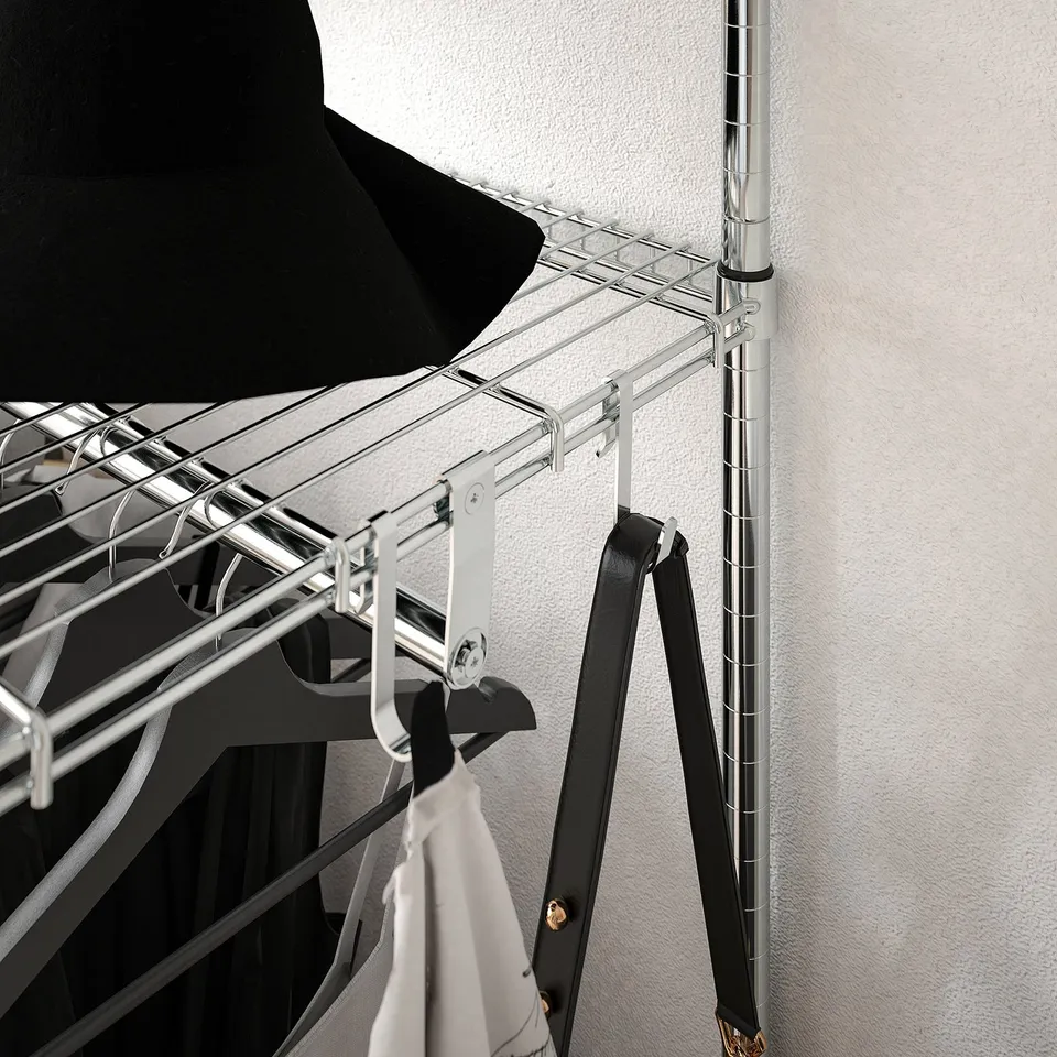 Shelving unit with clothes rail and adjustable feet, suitable for hallway or bedroom.