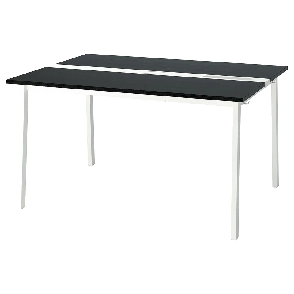 Black MITTZON conference table, sleek modern design with rectangular top, four white legs, and minimalist style.