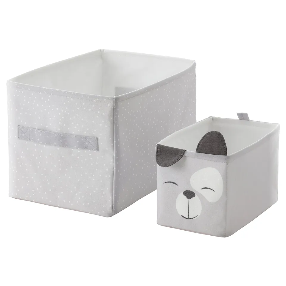 Two light grey fabric storage boxes with polka dots, one with a teddy bear design. Great for kids rooms, collapsible, eco-friendly.