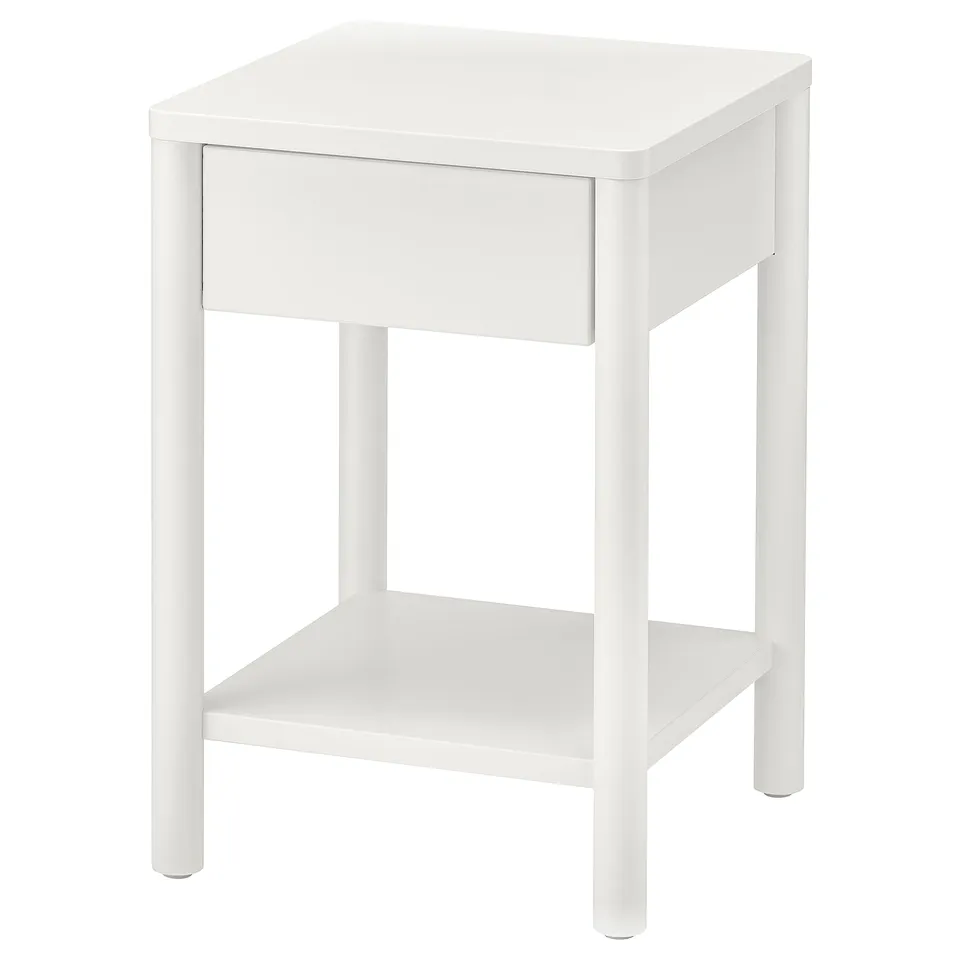 White TONSTAD bedside table with one drawer; classic, solid wood legs.