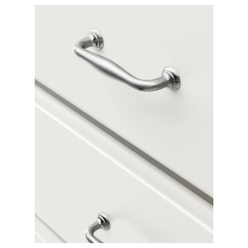 A sleek, modern drawer handle in polished chrome, showcasing smooth curves and high-quality craftsmanship.