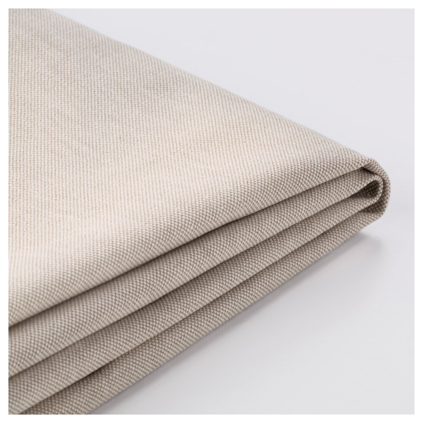 Folded light beige fabric, smooth texture visible, likely a high-quality sofa cover.