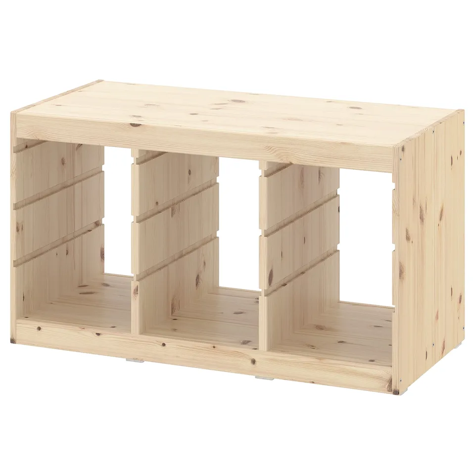 The TROFAST wooden storage unit in light pine, characterised by its rectangular shape and open compartments.