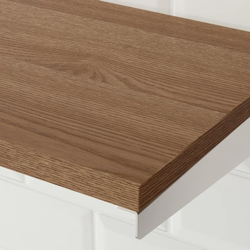Modern wooden shelf, light brown finish, mounted on sleek metal brackets.