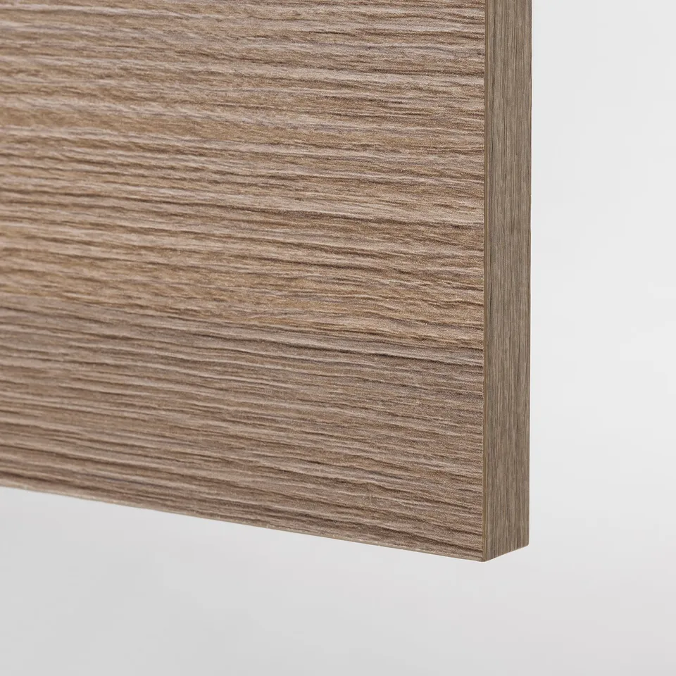Close-up of smooth, high-quality wood grain laminate. Even texture, hinting durability and easy cleaning.